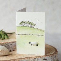 Mini Sheep beneath coppice on hill card