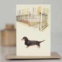 Mini Dachshund by city garden railings card